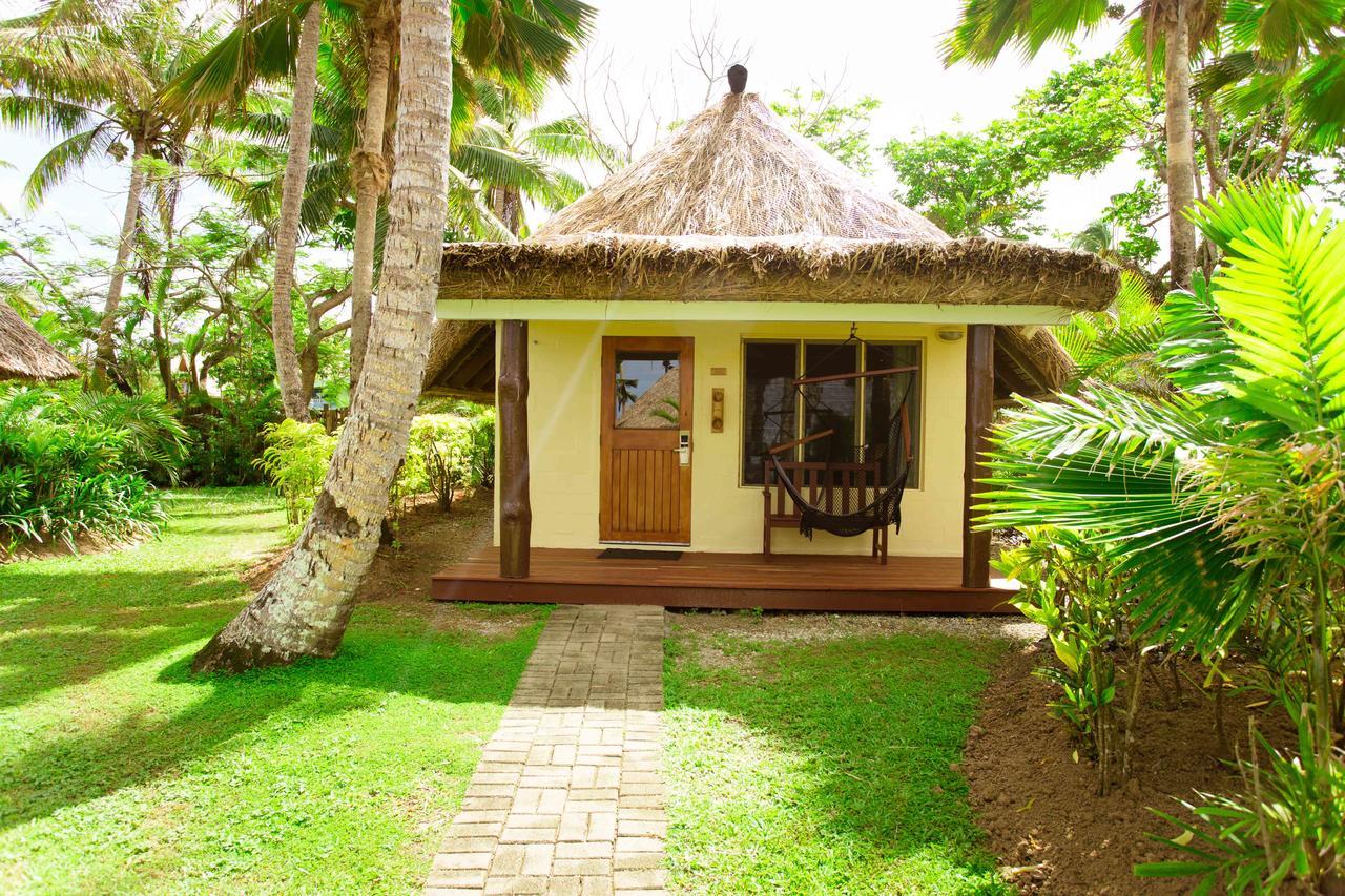 Outrigger Fiji Beach Resort Korotogo Εξωτερικό φωτογραφία A bungalow at the resort